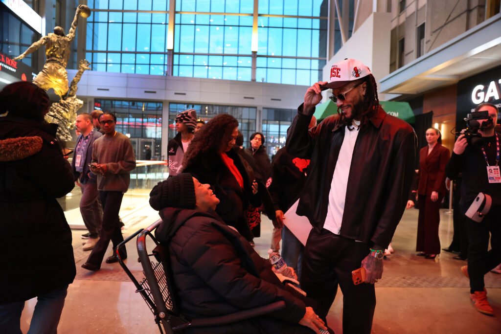 Derrick Rose chats with his mother Brenda (cq) inside the United Center atrium, decorated in his honor, prior to his #1 jersey being retired by the Chicago Bulls in a ceremony scheduled for after a game between the Bulls and the Boston Celtics on Jan. 24, 2026. (Chris Sweda/Chicago Tribune)